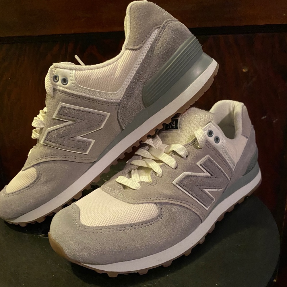 Grey and white New Balance Sneakers